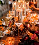 Tall Floating Candles
Photography: Boyd Harris Photographs
Read More:
http://www.insideweddings.com/weddings/alfresco-autumn-wedding-in-napa-california/457/ Champagne flute-shaped vases filled with candles