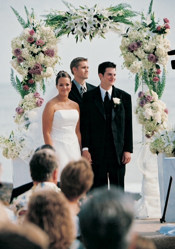 Beach Wedding Arch
Photography: Barnet Photography
Read More:
http://www.insideweddings.com/weddings/seaside-celebration-in-orange-county-california/32/ Oceanfront floral arch above newlyweds and officiant