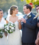 White Bridesmaid Dresses
Photography: Dalal Photography
Read More:
http://www.insideweddings.com/weddings/holiday-wedding-with-woodsy-winter-decor-elements/421/ Couple with bridesmaids in asymmetrical gowns
