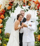 Bride and Groom at Ceremony
Photography: TripleCord Photography
Read More:
http://www.insideweddings.com/weddings/beachside-summer-wedding-at-the-montage-laguna-beach/287/ Officiant and couple under floral archway