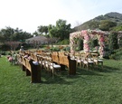 Floral Chuppah & Wooden Pews
