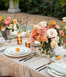 Pink and Orange Centerpieces
Photography: Collin Pierson Photography
Read More:
http://www.insideweddings.com/weddings/romantic-garden-inspired-styled-wedding-shoot-with-peach-hues/1191/ wedding inspiration styled shoot, pale pink, burgundy chair cushions, chameleon chairs