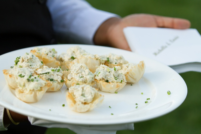 Passed Hors d'Oeuvres
Photography: Aaron Watson Photography
Read More:
http://www.insideweddings.com/weddings/classic-virginia-wedding-inspired-by-grace-kellys-elegance/511/ Phylo dough puff pastries with potato salad and chives