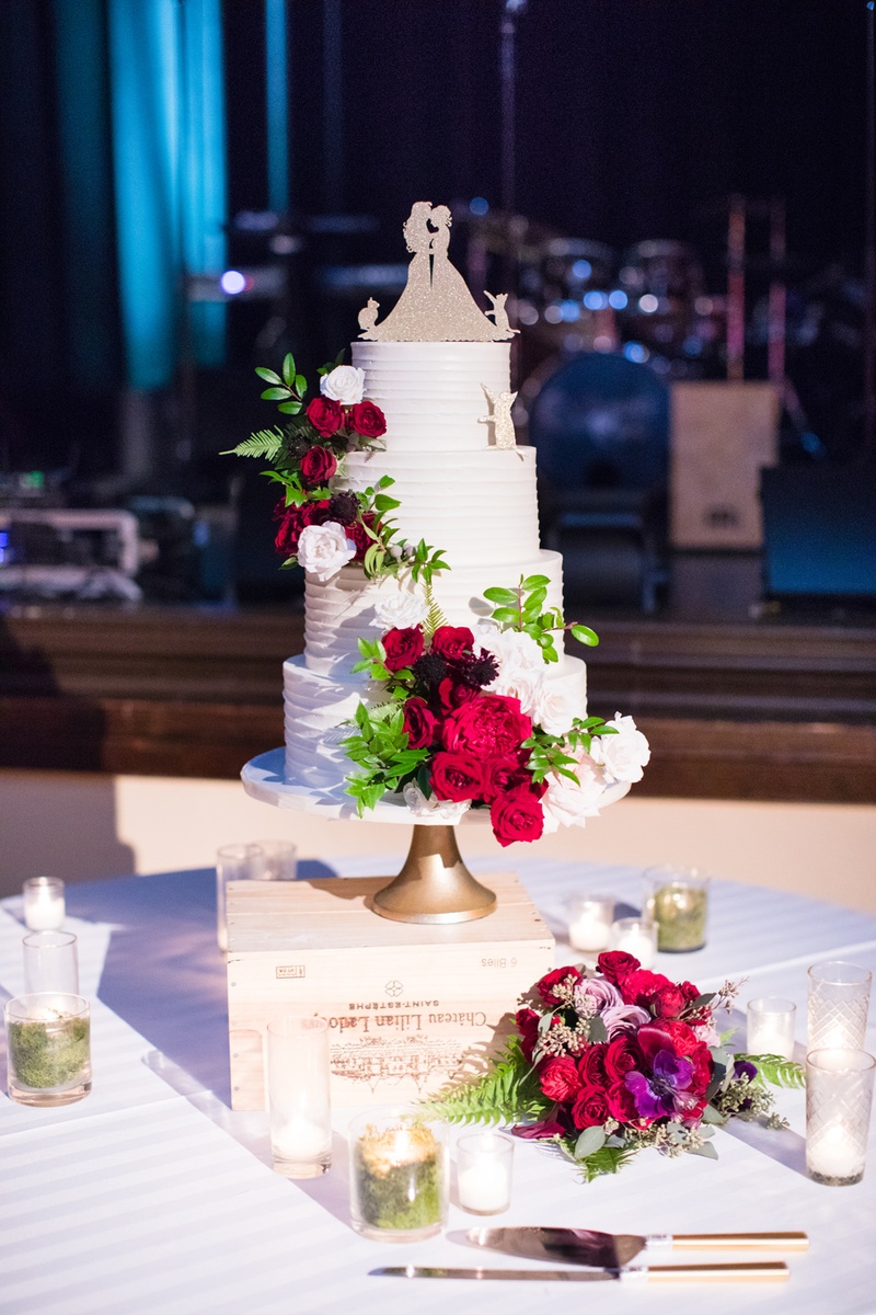 Minimalist Wedding Cake with Flowers
Photography: Acqua Photo
Read More:
http://www.insideweddings.com/weddings/balboa-park-wedding-with-wine-inspired-color-scheme-in-san-diego/948/ four-tier wedding cake with fresh flowers, same-sex lesbian wedding cake topper two brides cats
