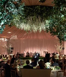 Guests Seated at Luxe Reception
Photography: KingenSmith
Read More:
http://www.insideweddings.com/weddings/luxe-jewish-wedding-with-personal-details-greenery-chinoiserie/1152/ wedding reception flower chandelier tented ballroom drapery head table dance floor live band low