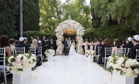Bride %26 Groom Under Chuppah Outdoors
Photography: Duke Images
Read More:
http://www.insideweddings.com/weddings/timeless-baroque-inspired-wedding-at-luxury-hotel-in-beverly-hills/1369/ wedding ceremony the beverly hills hotel neutral color palette blush and ivory white aisle runner