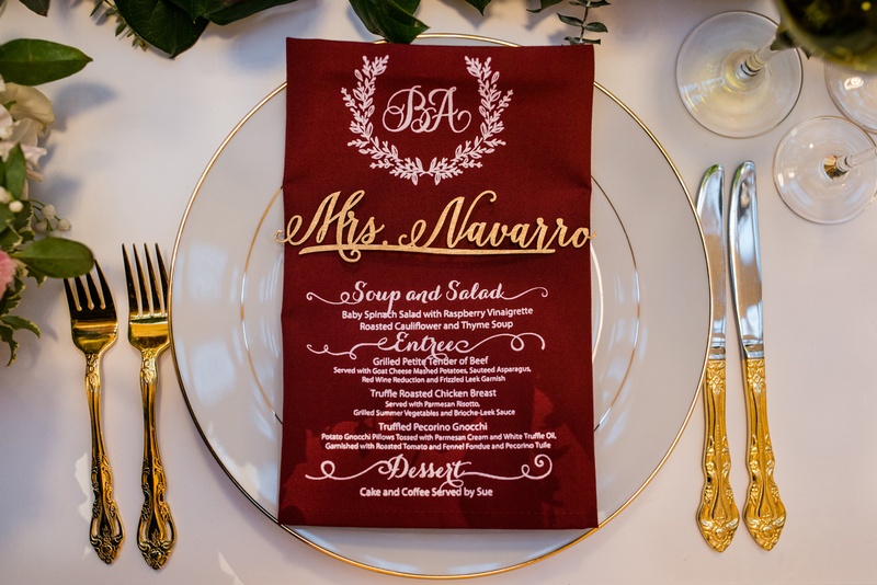 Gold Flatware %26 Laser-Cut Place Card
Photography: Kent Drake Photography
Read More:
http://www.insideweddings.com/weddings/an-event-planners-wedding-at-a-museum-by-sue-the-tyrannosaurus-rex/955/ Gold flatware next to charger plate with burgundy menu napkin and laser cut name tag