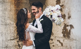 Bride in Lace Dress Holds Groom's Face
Photography: Ed %26 Aileen Photography
Read More:
http://www.insideweddings.com/weddings/jewish-wedding-with-rustic-and-elegant-design-elements-in-chicago/975/ Bride in off shoulder lace wedding dress holds groom's face after first look wedding photos