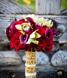 Gold-Wrapped Bouquet
Photography: Kim Fox Photography
Read More:
http://www.insideweddings.com/weddings/colorful-indian-summer-wedding-at-a-golf-course/449/ Indian bridal flowers and bouquet wrap