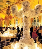 Flower-Covered Candelabra
Photography: Donna Newman Photography
Read More:
http://www.insideweddings.com/weddings/elegant-all-white-wedding-at-the-breakers-in-florida/362/ Wedding centerpiece with white flowers over tall candelholder