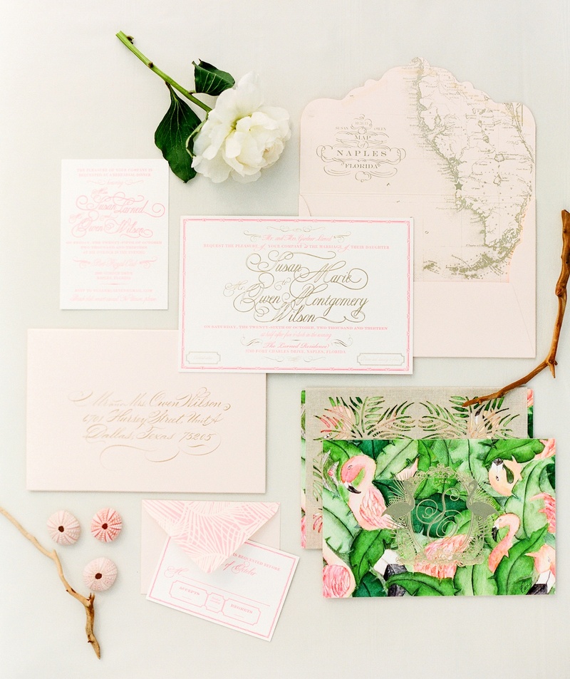 Tropical Invitation Suite
Photography: KT Merry Photography
Read More:
http://www.insideweddings.com/weddings/a-gorgeous-and-elegant-outdoor-florida-wedding/536/ Tropical wedding invitation suite with green fronds and flamingos on the cover and map of Florida