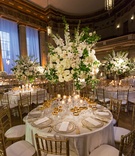 Tall Florals %26 Gold-Rimmed Glassware
Photography: Duke Photography
Read More:
http://www.insideweddings.com/weddings/grand-wedding-with-regal-decor-and-golden-details-in-washington-dc/1117/ Wedding reception round table gold chairs gold glassware tall centerpiece white flowers greenery