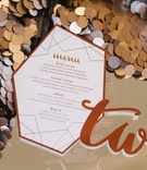 Contemporary Geometric Menu
Photography: Blue Rose Photography
Read More:
http://www.insideweddings.com/weddings/urban-chic-styled-wedding-shoot-with-unique-copper-accents/785/ a contemporary design for a reception menu in a copper color on large sequins