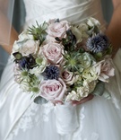 Unique Bridal Bouquet
Photography: David Wittig Photography
Read More:
http://www.insideweddings.com/weddings/vintage-inspired-chicago-wedding-with-rustic-elements/441/ Bride holding textured flowers in white wrap