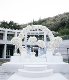 Circular Floral Altar
Photography: Kristina Lee Photography
Read More:
http://www.insideweddings.com/weddings/black-and-white-wedding-with-modern-mixed-metals-in-los-angeles/1009/ skirball cultural center wedding, raise altar with circle of florals