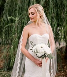 Bride Posing in Modified Trumpet Gown
Photography: Studio 623 Photography
Read More:
http://www.insideweddings.com/weddings/simple-rustic-park-wedding-with-diy-details-in-portland-oregon/894/ bride posing modified trumpet gown sweetheart neckline strapless lace beading veil portland wedding