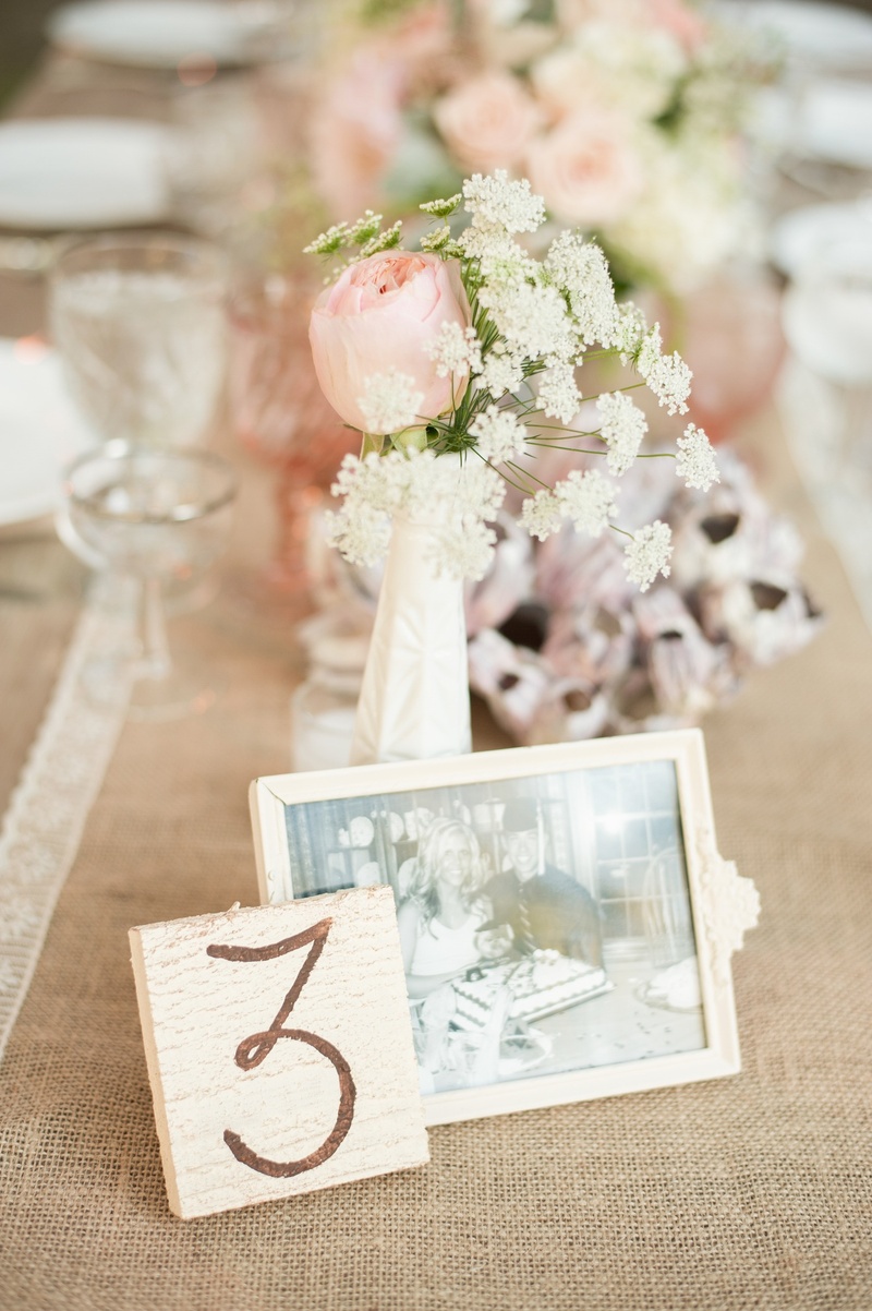 Rustic Table Numbers
Photography: Jana Williams Photography
Read More:
http://www.insideweddings.com/weddings/katrina-hodgson-and-brian-scott/533/ Framed photo of couple on burlap reception table