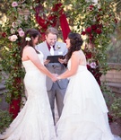 Brides Laugh During Vow Exchange
Photography: Acqua Photo
Read More:
http://www.insideweddings.com/weddings/balboa-park-wedding-with-wine-inspired-color-scheme-in-san-diego/948/ same-sex wedding, two brides, winnie couture gown, hayley paige gown, laughing during ceremony