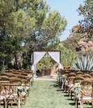 Minimal Décor for Outdoor Ceremony
Photography: Ether %26 Smith
Read More:
http://www.insideweddings.com/weddings/youtube-singer-megan-nicoles-romantic-outdoor-wedding-in-malibu/1163/ Megan Nicole youtube singer outdoor wedding wood vineyard chairs wood arbor drapery backyard wedding