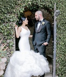 Couple in Doorway
Photography: Rene Zadori Photography
Read More:
http://www.insideweddings.com/weddings/opulent-wedding-with-classic-winter-white-color-scheme/1233/ bride in ines di santo wedding dress, v-neck fit-and-flare gown with full ruffles, groom in tuxedo