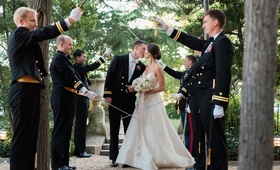 Couple in Arch of Swords
Photography: Sarah Bradshaw Photography
Read More:
http://www.insideweddings.com/weddings/stunning-military-wedding-with-garden-ceremony-in-washington-dc/999/ Navy military wedding bride and groom in tunnel arch of swords sabers wedding ceremony