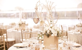 Handmade Wedding Centerpiece
Photography: Jana Williams Photography
Read More:
http://www.insideweddings.com/weddings/ivory-gold-blush-lakefront-new-hampshire-wedding/412/ Keri Lynn Pratt's DIY wedding table decorations