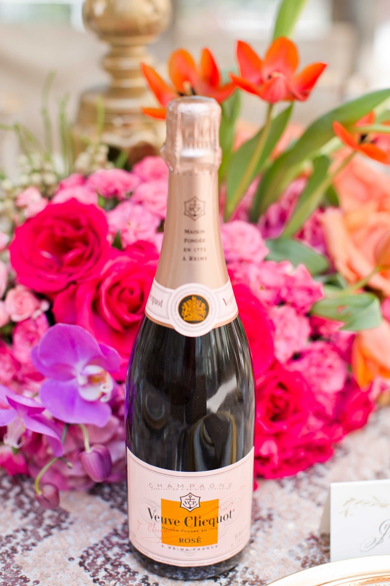 Champagne Bottle on Vibrant Tablescape
Photography: Thisbe Grace Photography
Read More:
http://www.insideweddings.com/weddings/fall-inspired-wedding-styled-shoot-featuring-bold-metallic-details/868/ champagne veuve clicquot bottle on vibrant tablescape expensive french drink wine bubbly wedding