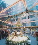 Cocktail Hour on Stage Beneath Chandelier
Photography: LuxRox
Read More:
http://www.insideweddings.com/weddings/alfresco-inspired-luxurious-hotel-wedding-in-washington-dc/1312/ wedding cocktail hour string musicians quartet on white stage greenery flowers chandelier open tent