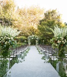 Elegant White %26 Green Ceremony Décor
Photography: Jessica Claire Photography
Read More:
http://www.insideweddings.com/weddings/destination-la-wedding-with-natural-rustic-organic-decor/1134/ hotel bel air outdoor wedding ceremony greenery white flowers white aisle runner