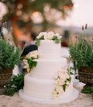 Round White Cake
Photography: Elizabeth Messina
Read More:
http://www.insideweddings.com/weddings/catriona-mcginn-and-mark-paul-gosselaar/428/ Wedding cake of Mark-Paul Gosselaar and wife