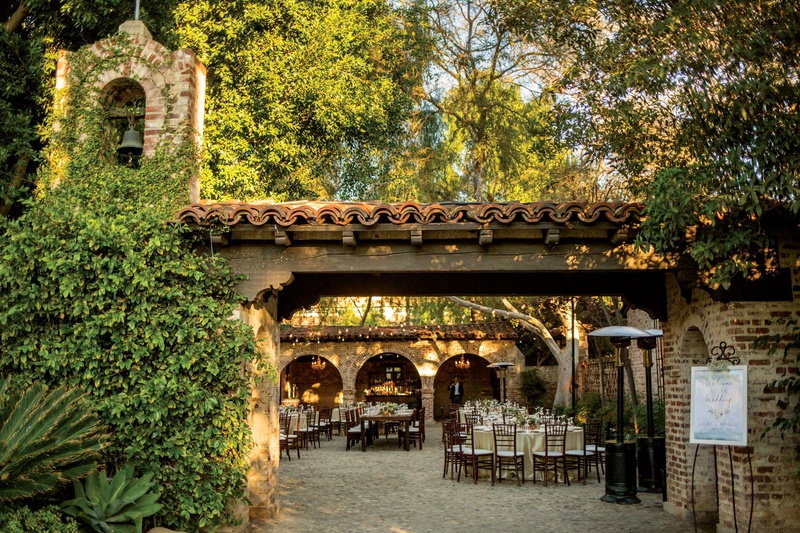 Entrance to Courtyard
Photography: Apertura
Read More:
http://www.insideweddings.com/weddings/warm-inviting-outdoor-fall-wedding-with-romantic-rustic-details/1363/ hummingbird next ranch wedding reception sitting bull ranch house with cobblestone courtyard
