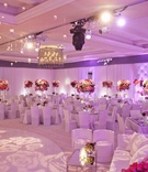 Contemporary Reception Space
Photography: Aaron Delesie Photographer
Read More:
http://www.insideweddings.com/weddings/all-white-beach-ceremony-sophisticated-ballroom-reception/364/ Ballroom illuminated with purple lighting and roses