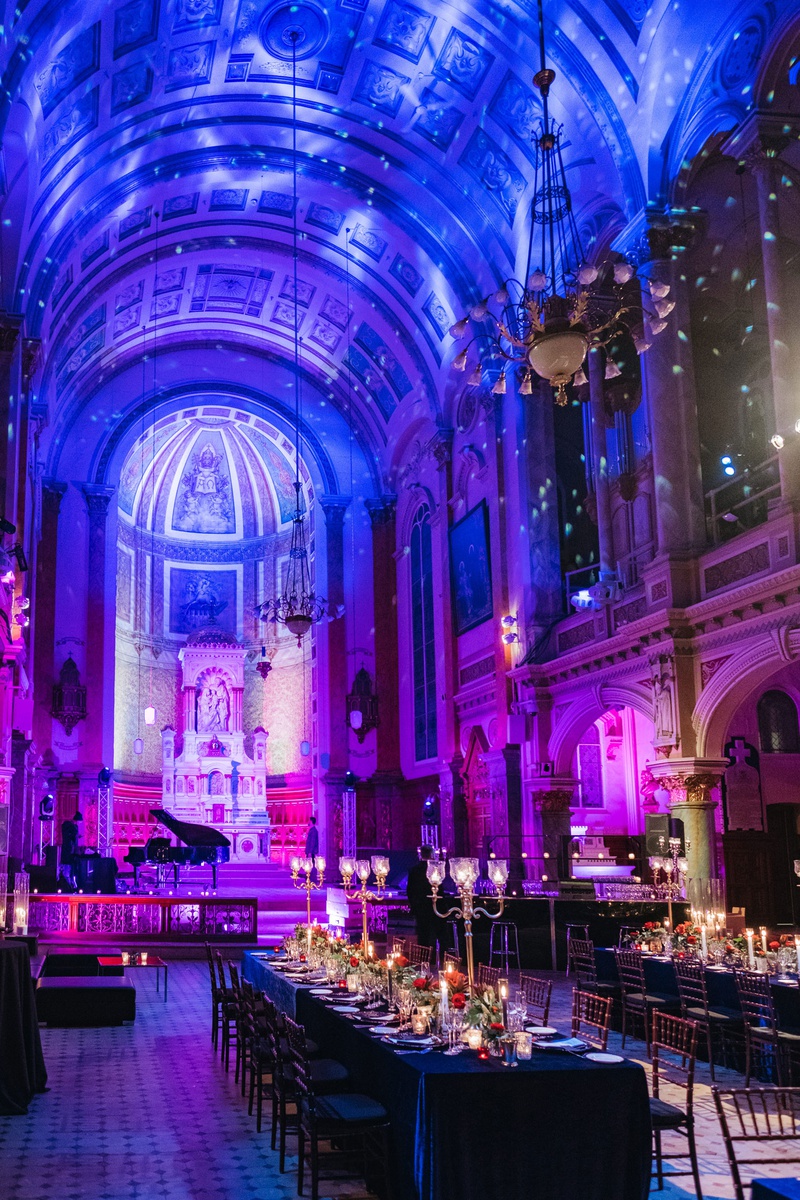Vibrant Reception Lighting in Quebec City
Photography: Joel %26 Justyna
Read More:
http://www.insideweddings.com/weddings/dreamy-winter-destination-wedding-in-an-ice-castle-in-quebec-city/1270/ wedding reception venue high arch ceiling former chapel cathedral long tables candelabra lights