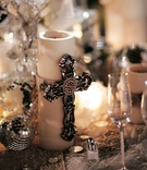 Silver Cross Centerpiece
Photography: Maring Lifestyle Photography
Read More:
http://www.insideweddings.com/weddings/winter-circus-wedding-at-the-ringling-museum-of-art-in-florida/150/ Reception centerpiece with silver Gothic cross on candle