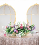 Thrones at Sweetheart Table
Photography: Keith + Melissa Photography
Read More:
http://www.insideweddings.com/weddings/magical-fairy-tale-wedding-fit-for-a-princess-at-a-castle-venue/1293/ white and gold rounded thrones at sweetheart table
