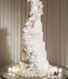 White Seven-Tier Wedding Cake
Photography: Duke Images
Read More:
http://www.insideweddings.com/weddings/timeless-baroque-inspired-wedding-at-luxury-hotel-in-beverly-hills/1369/ wedding cake seven layer white orchid cascading down ruffle tier