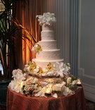 Round Wedding Cake
Photography: Lawrence Crandall Photography
Read More:
http://www.insideweddings.com/weddings/fall-inspired-california-wedding-nyc-themed-after-party/212/ Five layer cake with lily and orchid flowers