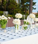 Floral Display Table
Photography: Elizabeth Solano
Read More:
http://www.insideweddings.com/weddings/seaside-wedding-at-the-resort-pelican-hill-newport-beach/394/ Seating cards on table with white flower arrangements