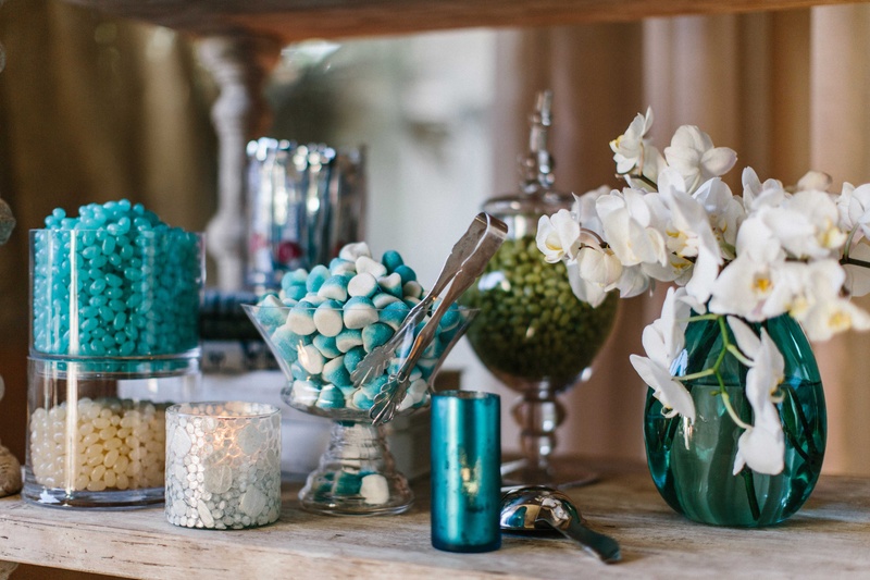 Blue %26 Ivory Candy Bar
Photography: Braedon Photography
Read More:
http://www.insideweddings.com/weddings/orthodox-jewish-wedding-with-outdoor-ceremony-inspired-by-the-sea/812/ Wood shelf with blue and white candies in glass bowls and vessels white orchids