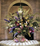 Elaborate Escort Card Table
Photography: Christian Oth Studio
Read More:
http://www.insideweddings.com/weddings/summer-wedding-packed-with-details-at-the-new-york-public-library/235/ Large floral arrangement and simple seating cards