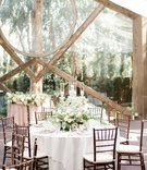 Florals with Candelabrum
Photography: Jenny Quicksall Photography
Read More:
http://www.insideweddings.com/weddings/romantic-rustic-wedding-in-malibu-with-jewish-english-traditions/1092/ calamigos ranch oak room wedding, crystal candelabra with floral arrangement