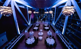 Purple Lighting at Presidential Library
Photography: Sterling Imageworks
Read More:
http://www.insideweddings.com/weddings/sophisticated-soiree-at-a-presidential-library-in-little-rock/1033/ Clinton Library wedding venue reception purple lighting modern fixtures white tablecloths