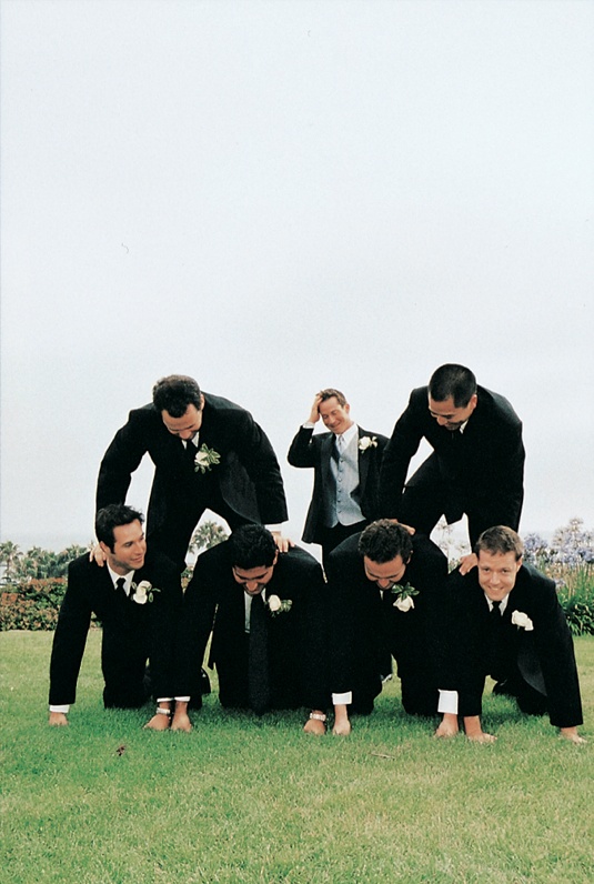 Groomsmen Pyramid
Photography: Tina Carlone Photography
Read More:
http://www.insideweddings.com/weddings/mediterranean-inspired-newport-beach-wedding/39/ Groom and groomsmen set up a human pyramid