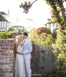 Bride and Groom Kiss
Photography: Samuel Lippke Studios
Read More:
http://www.insideweddings.com/weddings/elegant-summer-beach-wedding-in-southern-california/537/ Couple kissing against bricks next to wood gate