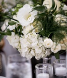 White and Green Centerpiece
Photography: Laurie Bailey Photography
Read More:
http://www.insideweddings.com/weddings/summer-soiree-with-lush-floral-elements-in-los-angeles-california/1170/ white hydrangeas, ivory roses, greenery, low wedding centerpiece with white florals and greenery