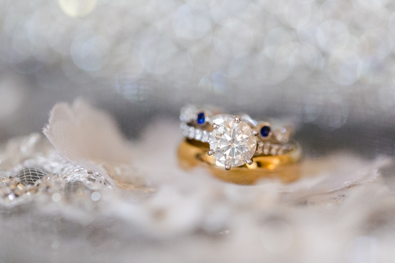 Solitaire Engagement Ring
Photography: Renee Sprink Photography
Read More:
http://www.insideweddings.com/weddings/a-blue-white-gold-military-wedding-at-duke-university-chapel/622/ Six prong diamond engagement ring and gold wedding band
