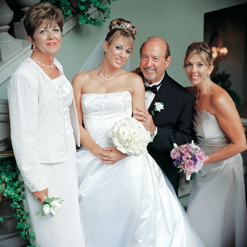 Bride's Family
Photography: Tony Florez Photography
Read More:
http://www.insideweddings.com/weddings/grand-ballroom-wedding-at-the-ritz-carlton-in-southern-california/97/ Bride smiles with mother of the bride, father, and sister