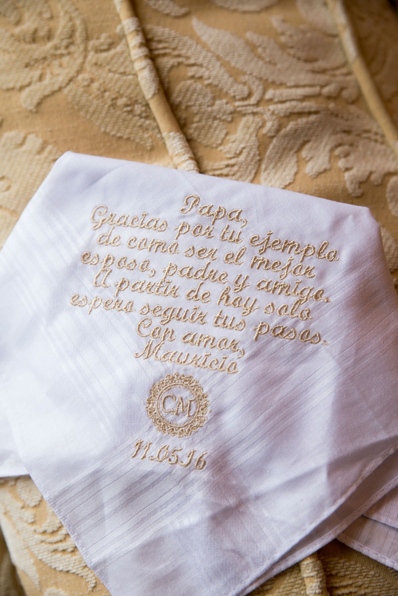 Gold-Embroidered Handkerchief
Photography: Nancy Cohn Photography
Read More:
http://www.insideweddings.com/weddings/destination-wedding-with-white-gold-color-palette-in-palm-beach/1028/ White handkerchief for father of bride embroidery in gold thread monogram and wedding date spanish