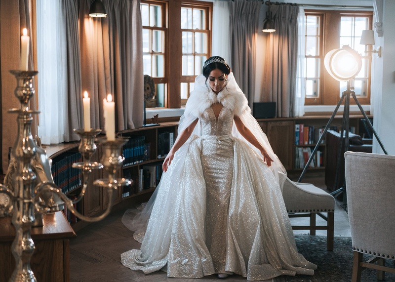 Sparkling Wedding Dress %26 Overskirt
Photography: Joel %26 Justyna
Read More:
http://www.insideweddings.com/weddings/dreamy-winter-destination-wedding-in-an-ice-castle-in-quebec-city/1270/ bride in sparkle pnina tornai wedding dress matching over skirt fur cape coat headpiece