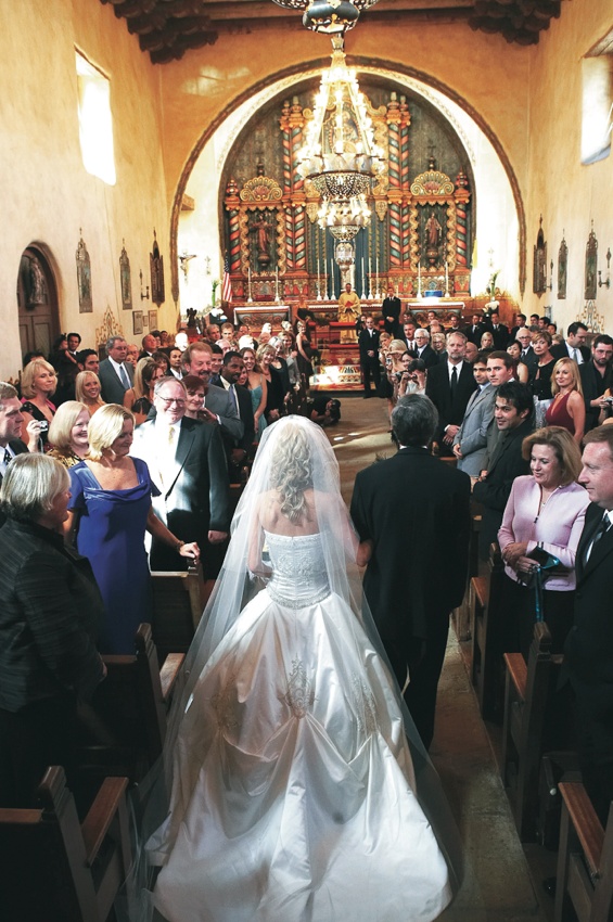 Ceremony Processional
Photography: Tony Florez Photography
Read More:
http://www.insideweddings.com/weddings/peacock-feather-themed-wedding-in-santa-barbara-california/166/ Bride walking down aisle with father in church